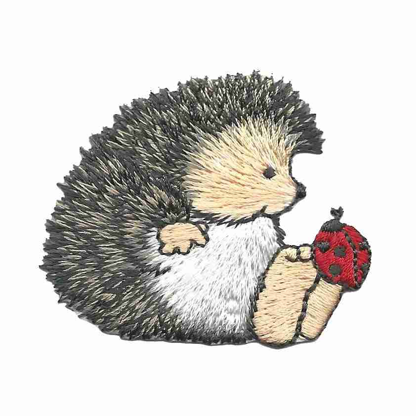 A little Cute Hedgehog Patch with a Ladybug on it's Toes (3-Pack) Iron on Patch on his hand.