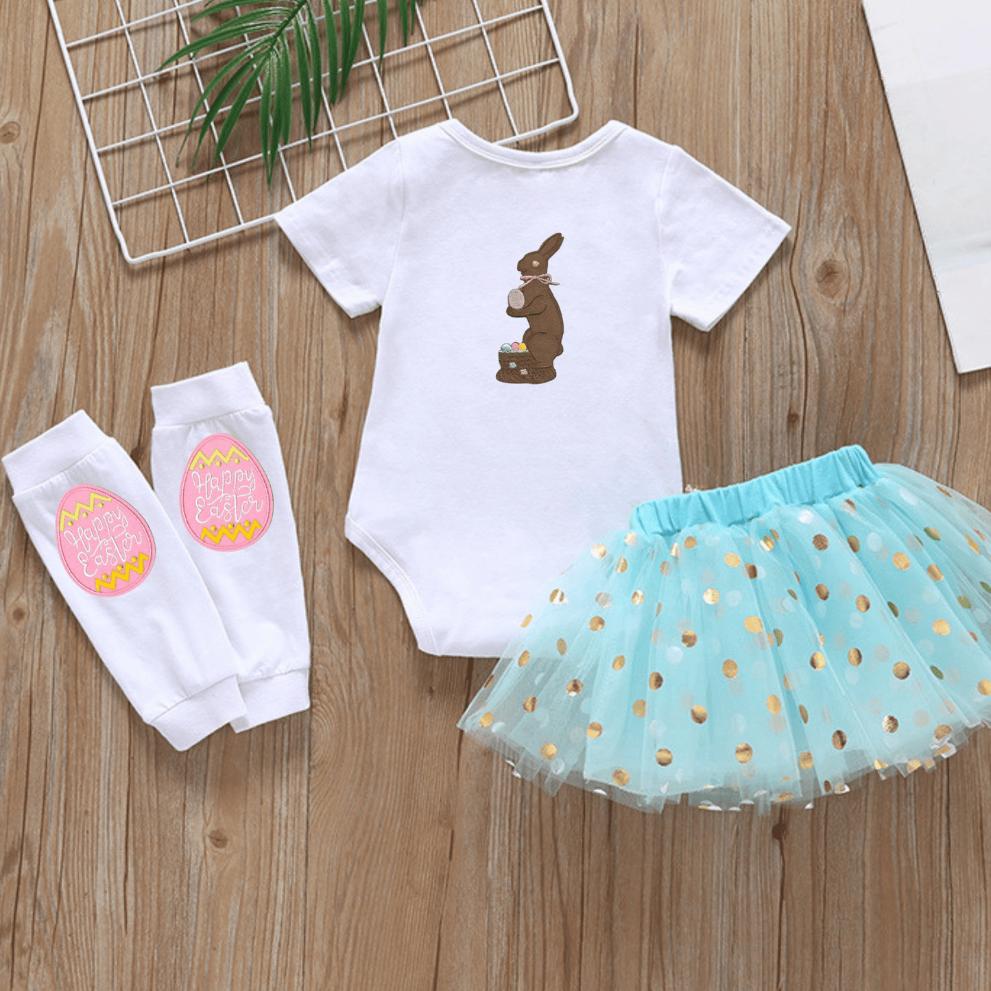 A baby girl's outfit with bunny tee and tutu.