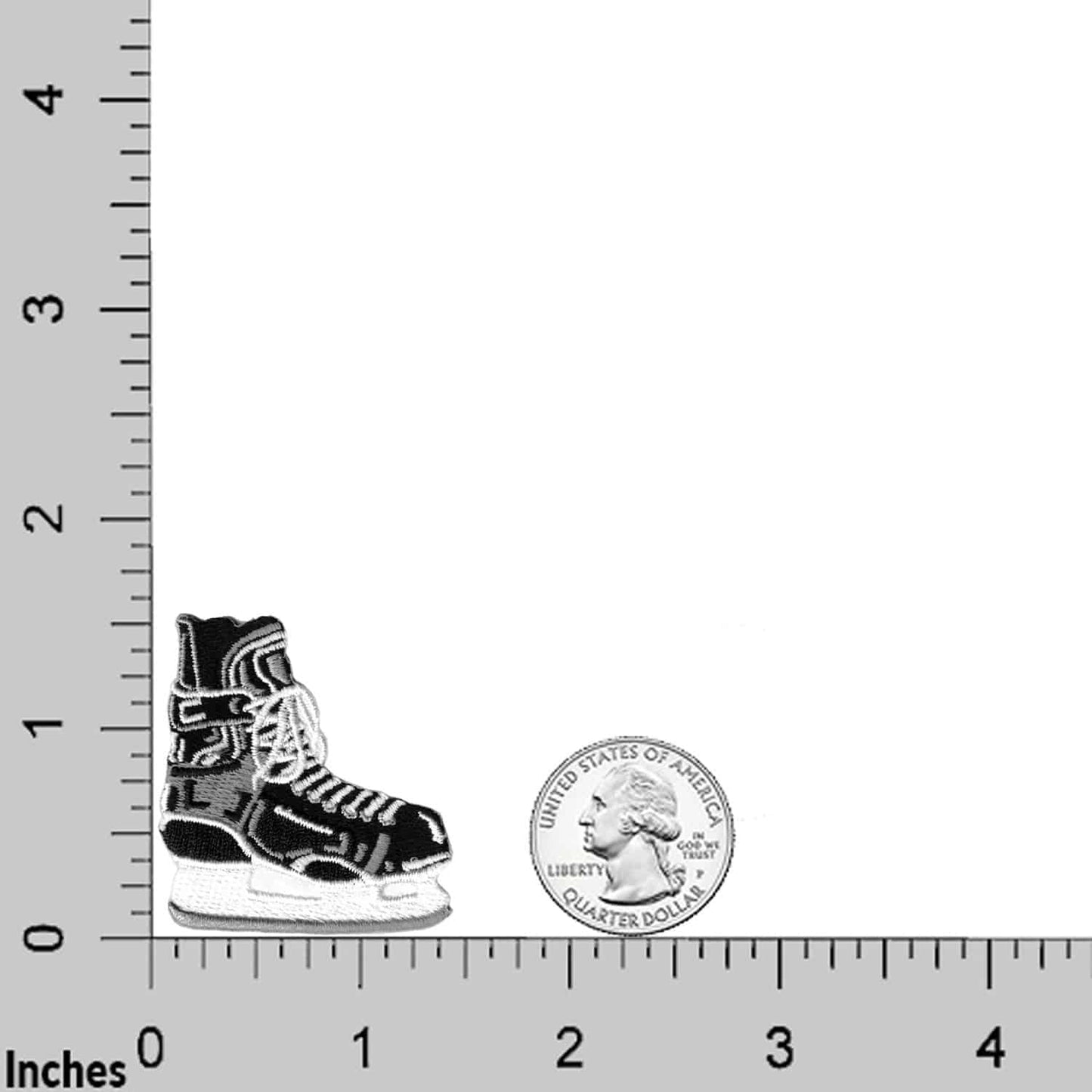 A pair of Ice Hockey Skate (4-Pack) Iron On Patch Appliques next to a ruler.