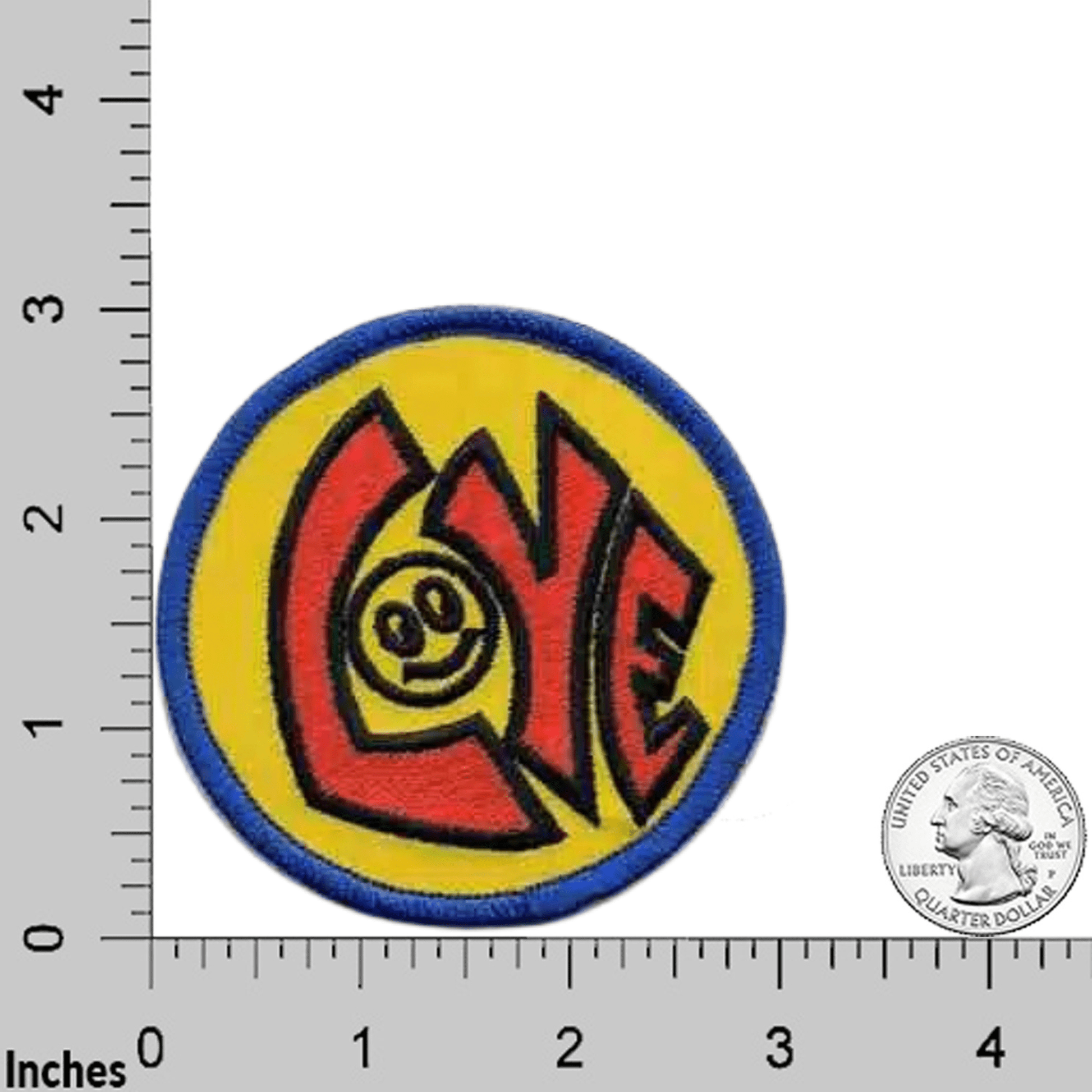 The Laughing Lizards Love with Happy Face (2-Pack) Iron On Patch features a round yellow design with "LOVE" and a smiley face, shown next to a ruler and US quarter for scale. Ideal for jackets, bags, or hats.