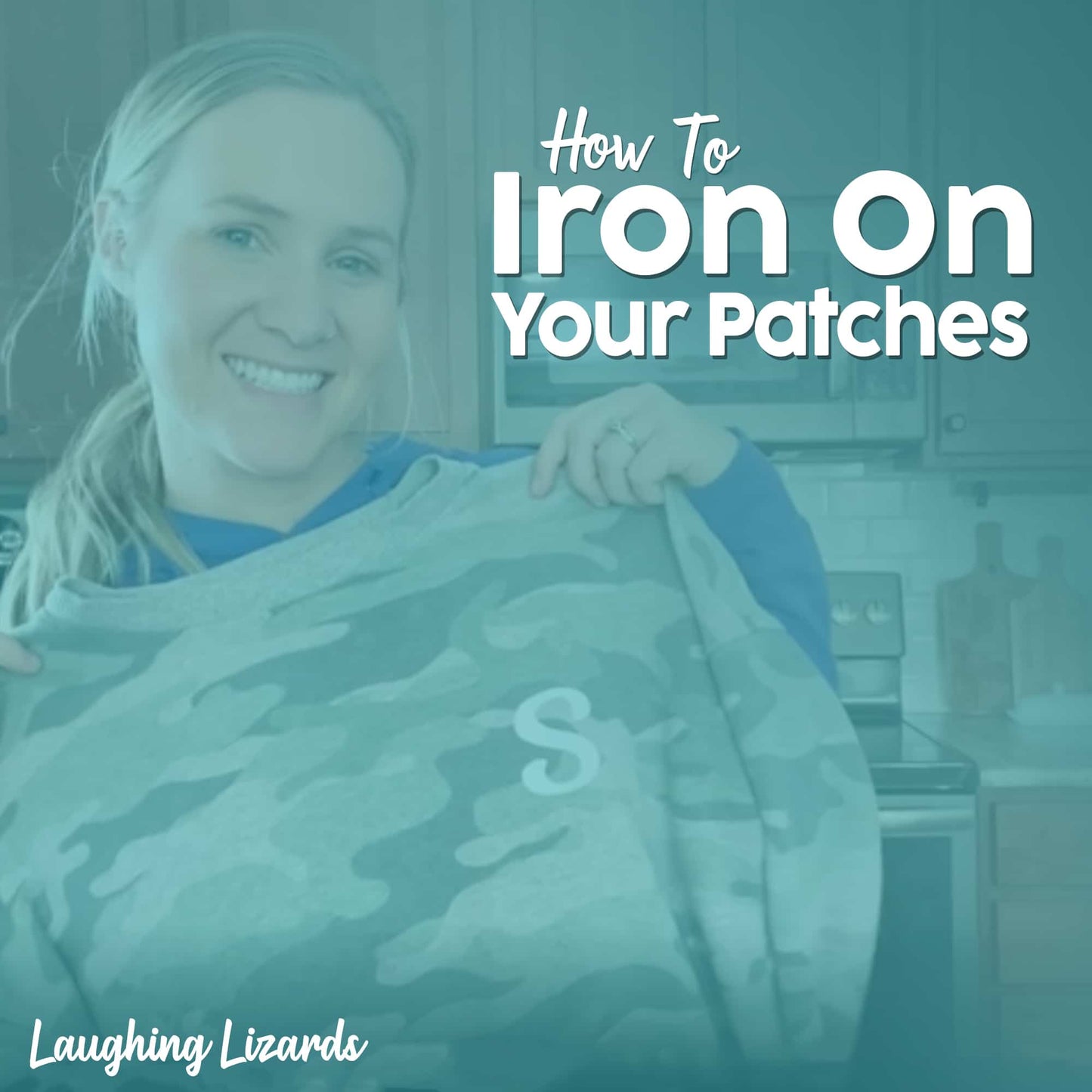 A woman holds a camouflage shirt with a Small Irish Flag Patch by Laughing Lizards in a kitchen. Text reads "How to Iron On Your Patches" and "Laughing Lizards.