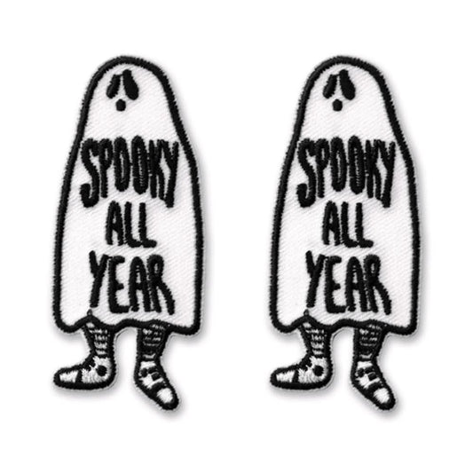 The Laughing Lizards Spooky All Year Iron On Patch Embroidered Applique features two ghost-shaped patches with striped legs and surprised faces—fun Halloween decorations for your costume or jacket.