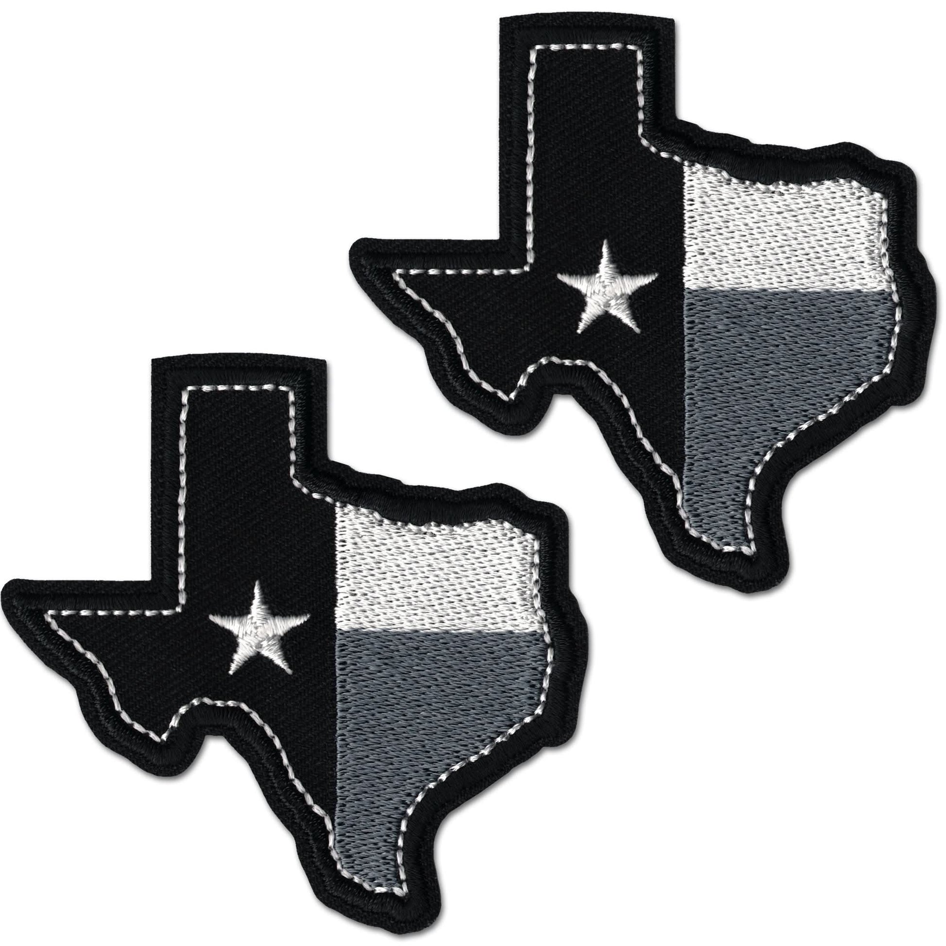 The Laughing Lizards Texas Flag Patches (2-Pack) feature embroidered black, gray, and white USA flag designs with a star on the left—ideal as a Texas patch or patriotic gift.